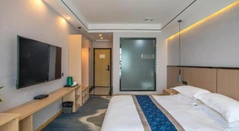 Bed in GELI Hotel Huainan Railway Station Sports Center