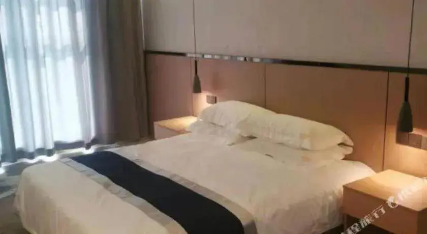 Bed in GELI Hotel Huainan Railway Station Sports Center Bed in GELI Hotel Huainan Railway Station Sports Center