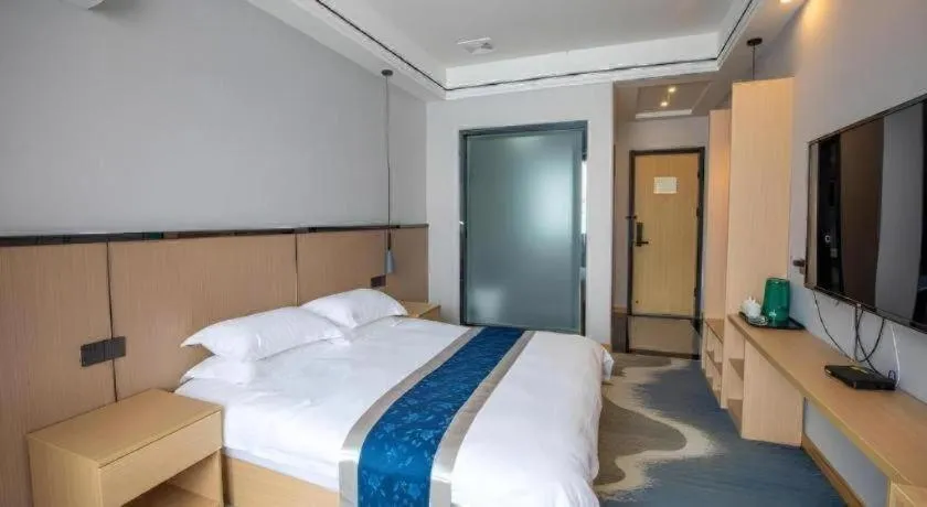 Bed in GELI Hotel Huainan Railway Station Sports Center