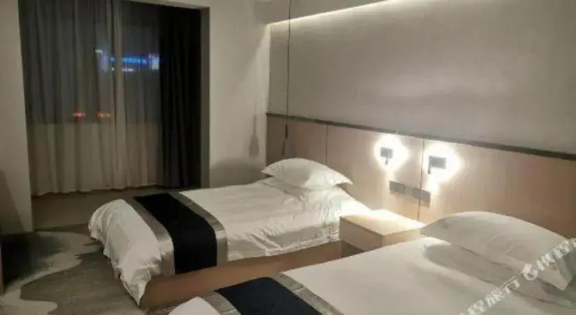 Bed in GELI Hotel Huainan Railway Station Sports Center Bed in GELI Hotel Huainan Railway Station Sports Center
