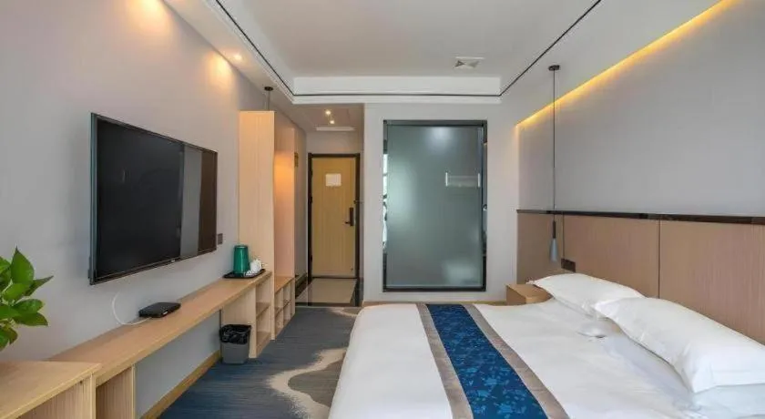 Bed in GELI Hotel Huainan Railway Station Sports Center