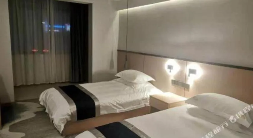 Bed in GELI Hotel Huainan Railway Station Sports Center