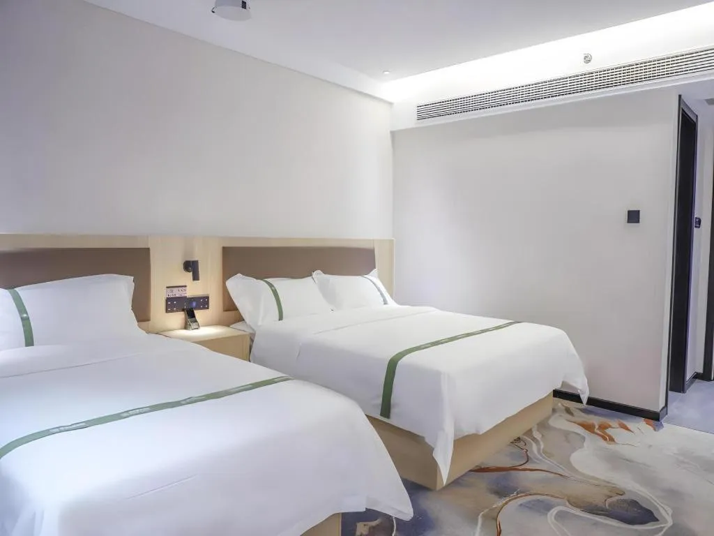 Bed in GreenTree Inn Express Hefei City Bus Station