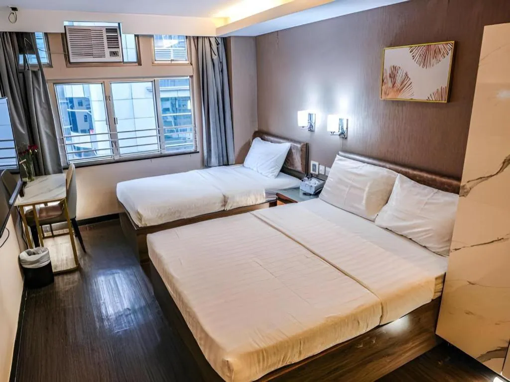 Bed in Sunny Day Hotel