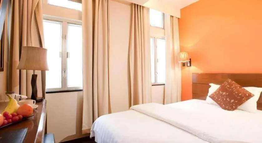 Bed in Sunny Day Hotel