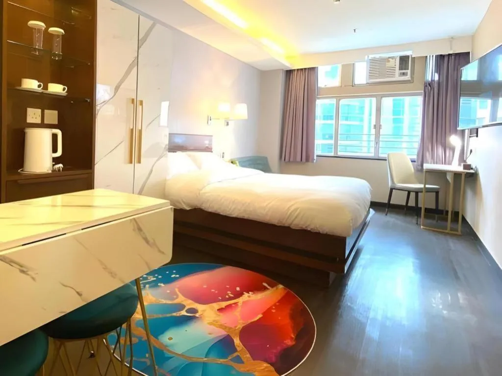 Bed in Sunny Day Hotel