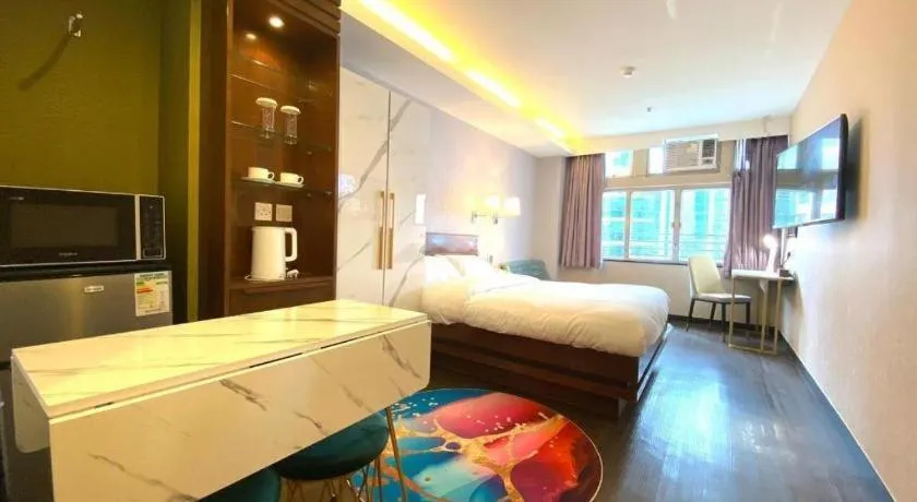 Bed in Sunny Day Hotel