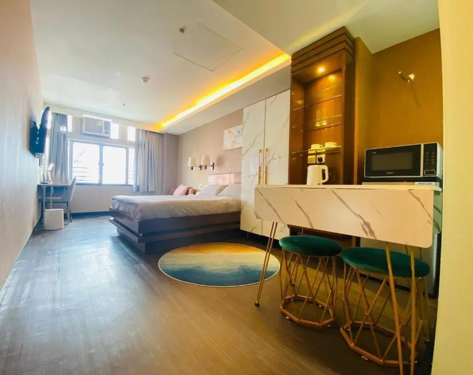 Bed in Sunny Day Hotel