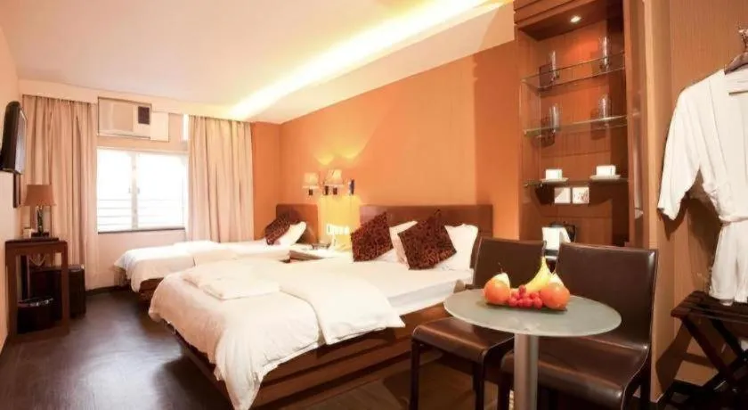 Bed in Sunny Day Hotel