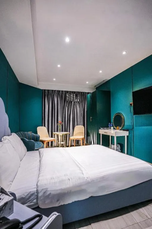 Bed in Sunny Day Hotel