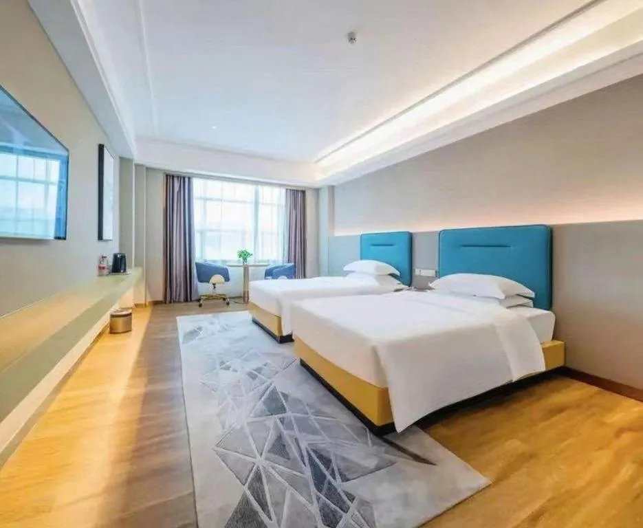 Bed in Cheermay Hotels