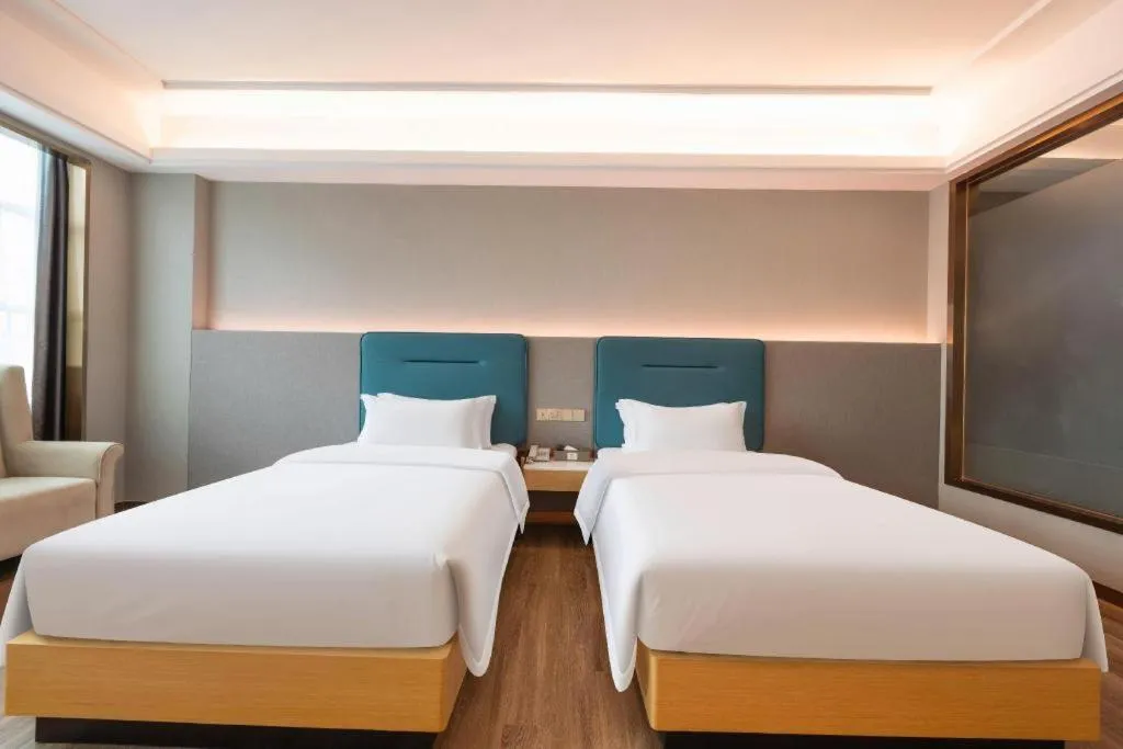 Bed in Cheermay Hotels