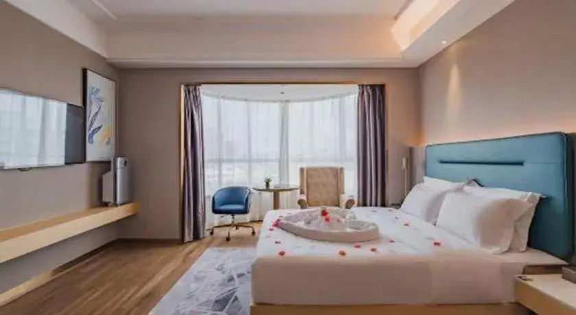 Bed in Cheermay Hotels Bed in Cheermay Hotels