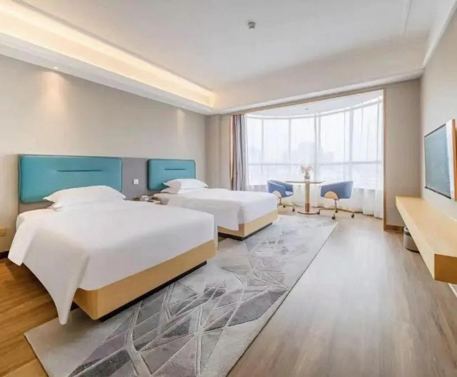 Bed in Cheermay Hotels