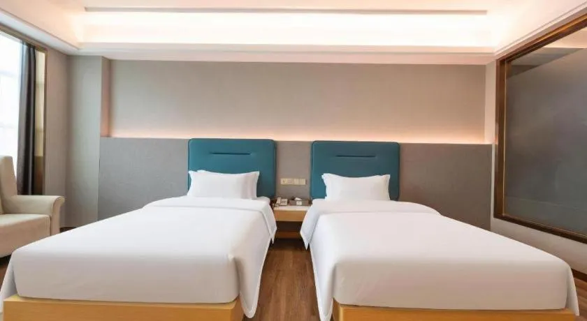 Bed in Cheermay Hotels