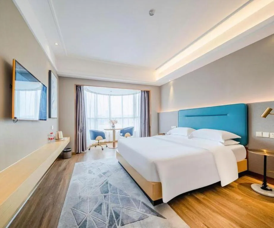 Bed in Cheermay Hotels