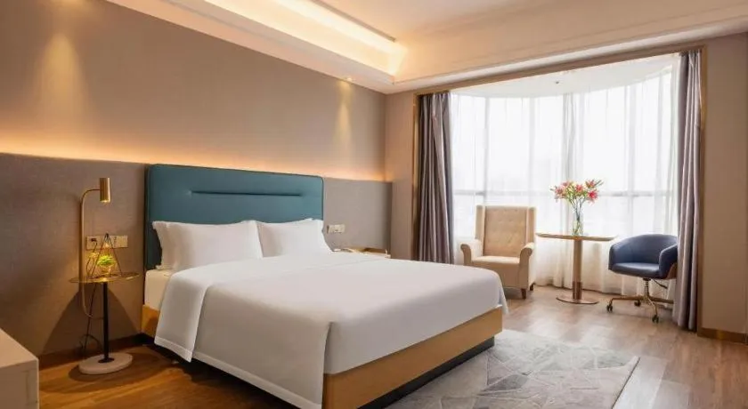 Bed in Cheermay Hotels