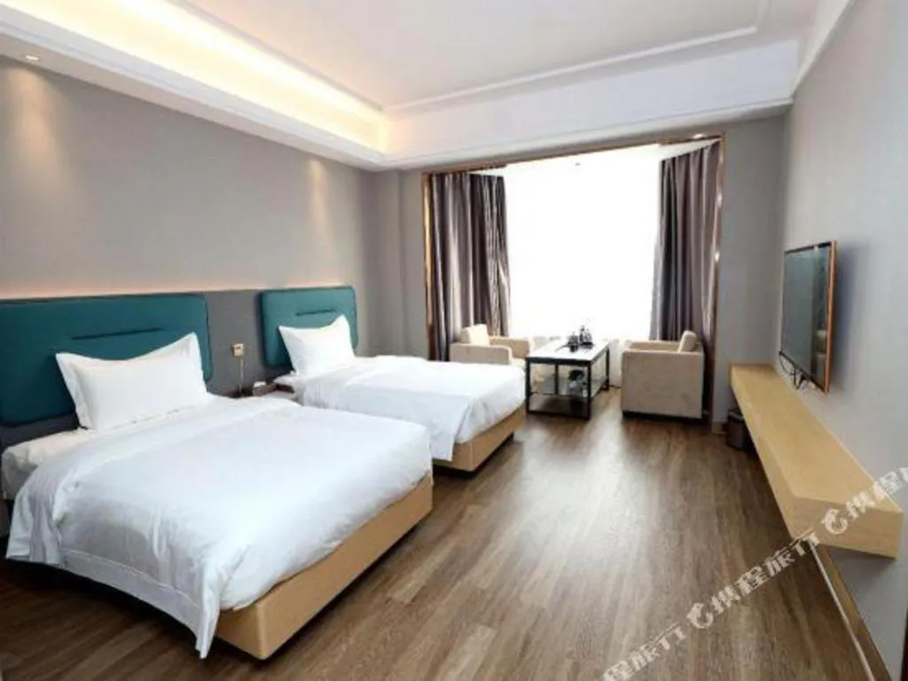 Bed in Cheermay Hotels