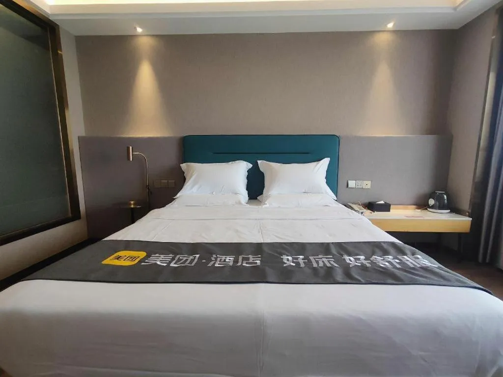 Bed in Cheermay Hotels