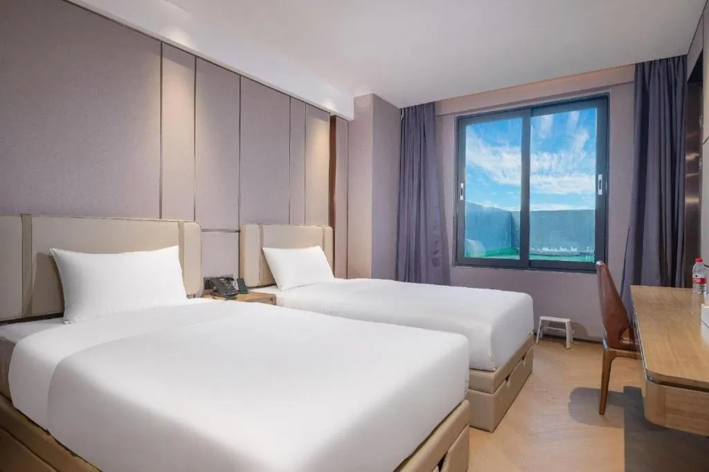 Bed in AMIGO migo Sleeping Hotel (mission hills)