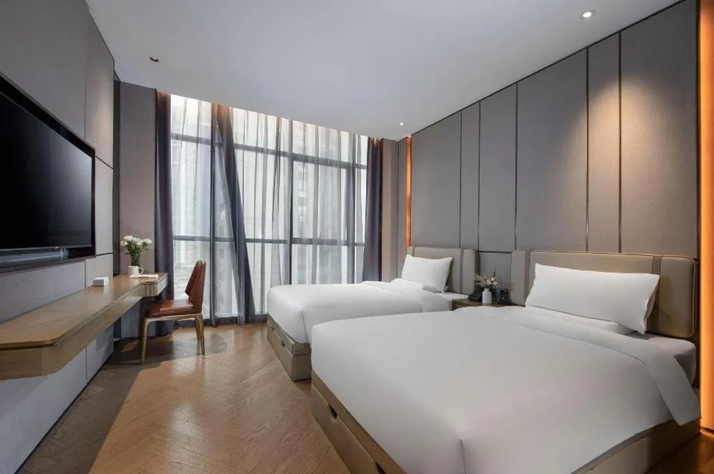 Bed in AMIGO migo Sleeping Hotel (mission hills)