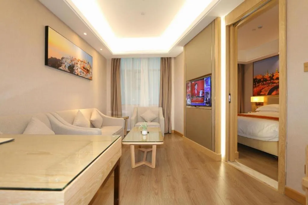 Bed in SHANGJINGHAO HOTEL （SAKATA SNOW ELEPHANT SUBWAY STATION SHOP）