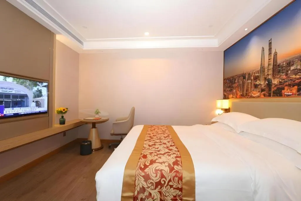 Bed in SHANGJINGHAO HOTEL （SAKATA SNOW ELEPHANT SUBWAY STATION SHOP）