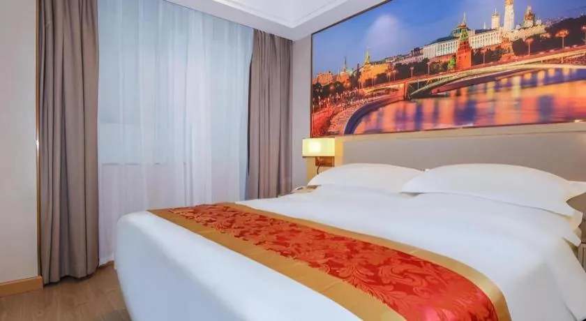 Bed in SHANGJINGHAO HOTEL （SAKATA SNOW ELEPHANT SUBWAY STATION SHOP）