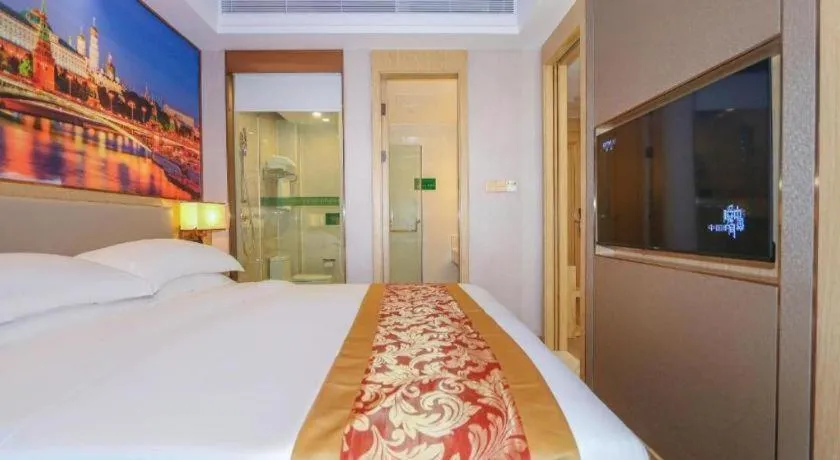 Bed in SHANGJINGHAO HOTEL （SAKATA SNOW ELEPHANT SUBWAY STATION SHOP）