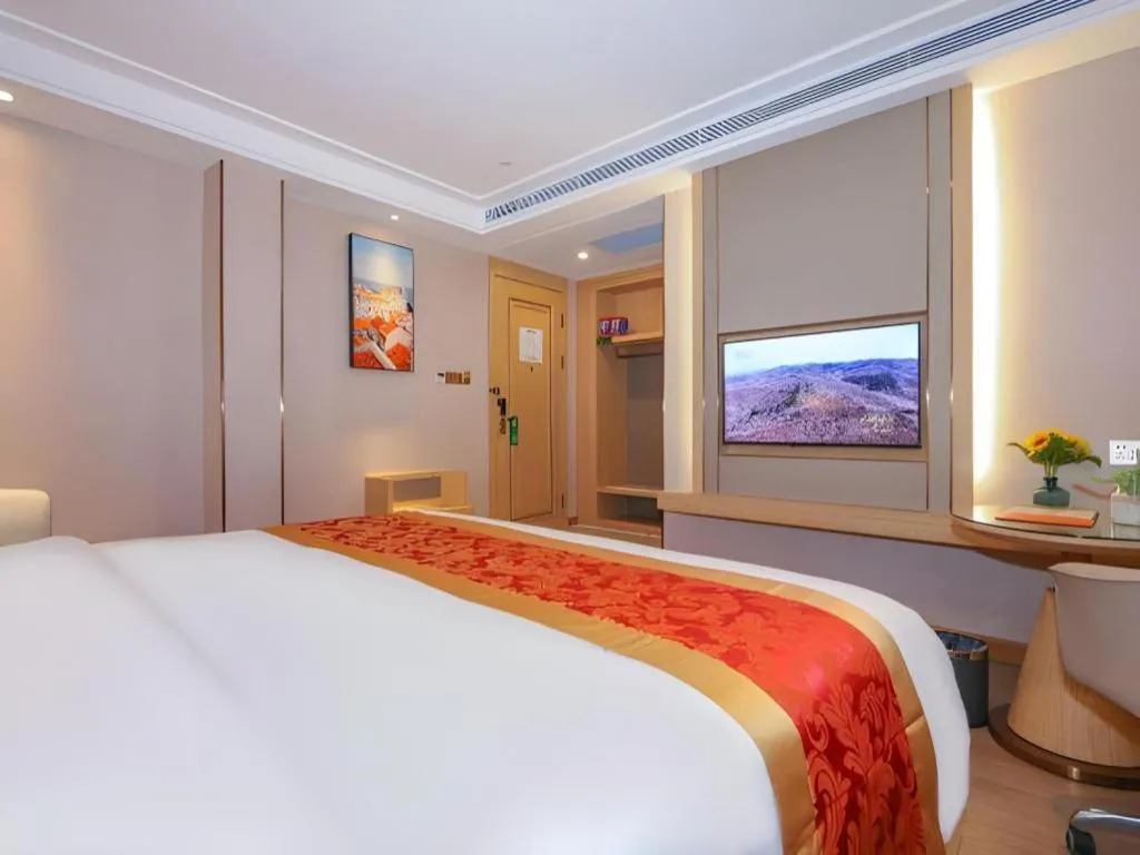 Bed in SHANGJINGHAO HOTEL （SAKATA SNOW ELEPHANT SUBWAY STATION SHOP）