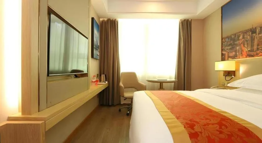 Bed in SHANGJINGHAO HOTEL （SAKATA SNOW ELEPHANT SUBWAY STATION SHOP）