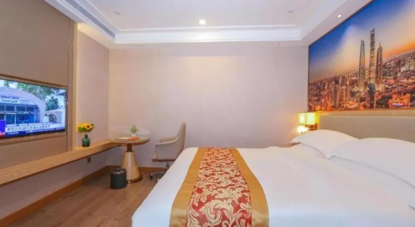 Bed in SHANGJINGHAO HOTEL （SAKATA SNOW ELEPHANT SUBWAY STATION SHOP）