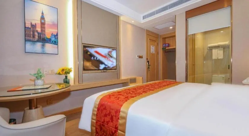Bed in SHANGJINGHAO HOTEL （SAKATA SNOW ELEPHANT SUBWAY STATION SHOP）