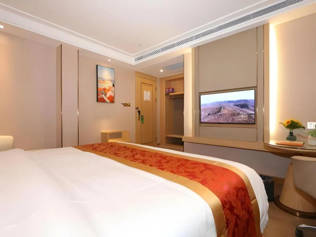 Bed in SHANGJINGHAO HOTEL （SAKATA SNOW ELEPHANT SUBWAY STATION SHOP）