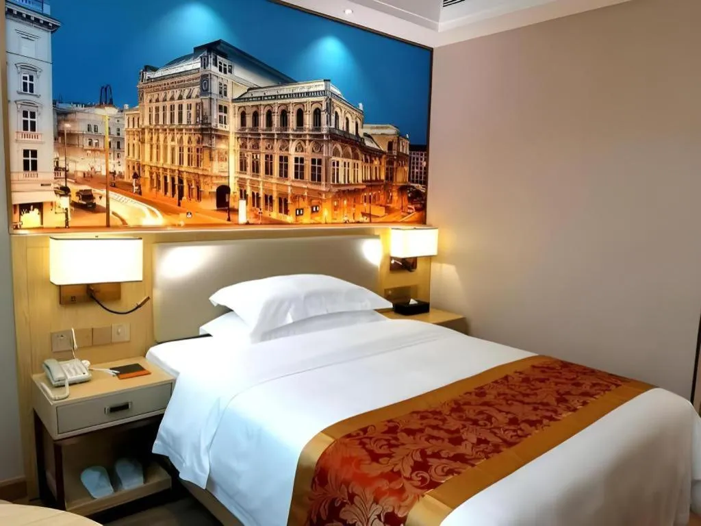Bed in SHANGJINGHAO HOTEL （SAKATA SNOW ELEPHANT SUBWAY STATION SHOP）