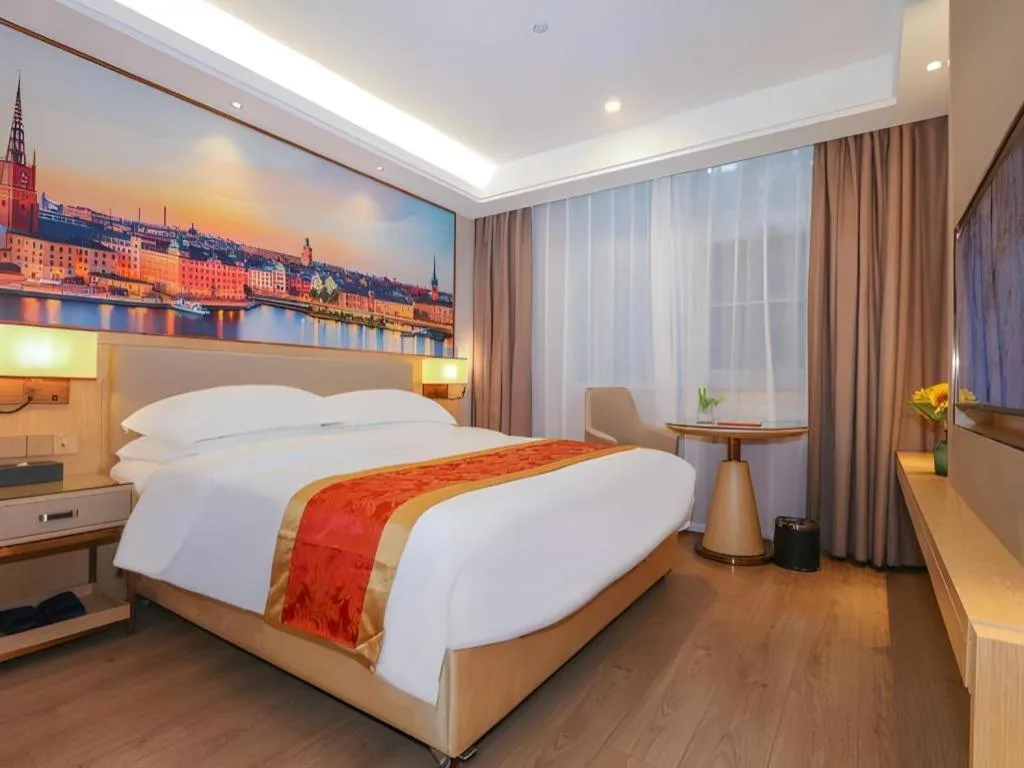 Bed in SHANGJINGHAO HOTEL （SAKATA SNOW ELEPHANT SUBWAY STATION SHOP）