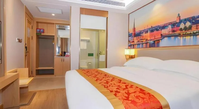 Bed in SHANGJINGHAO HOTEL （SAKATA SNOW ELEPHANT SUBWAY STATION SHOP）