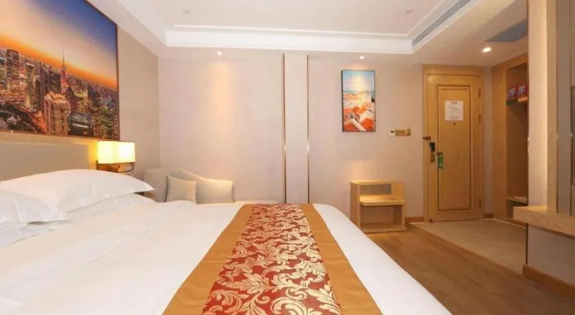 Bed in SHANGJINGHAO HOTEL （SAKATA SNOW ELEPHANT SUBWAY STATION SHOP）