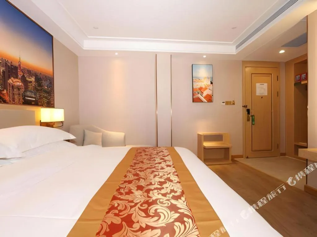 Bed in SHANGJINGHAO HOTEL （SAKATA SNOW ELEPHANT SUBWAY STATION SHOP）