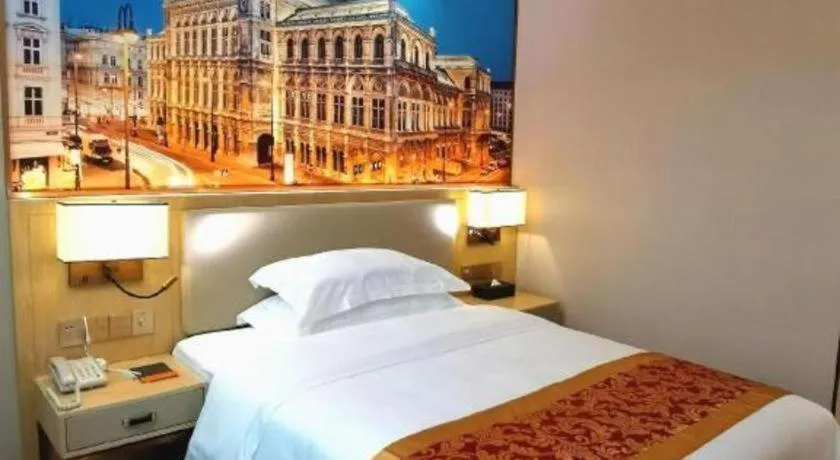 Bed in SHANGJINGHAO HOTEL （SAKATA SNOW ELEPHANT SUBWAY STATION SHOP）