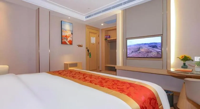 Bed in SHANGJINGHAO HOTEL （SAKATA SNOW ELEPHANT SUBWAY STATION SHOP）