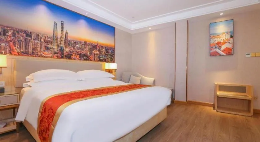 Bed in SHANGJINGHAO HOTEL （SAKATA SNOW ELEPHANT SUBWAY STATION SHOP）