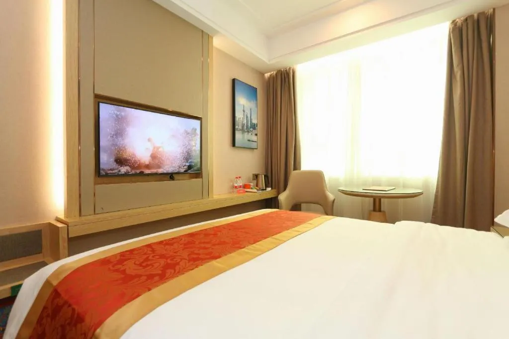 Bed in SHANGJINGHAO HOTEL （SAKATA SNOW ELEPHANT SUBWAY STATION SHOP）