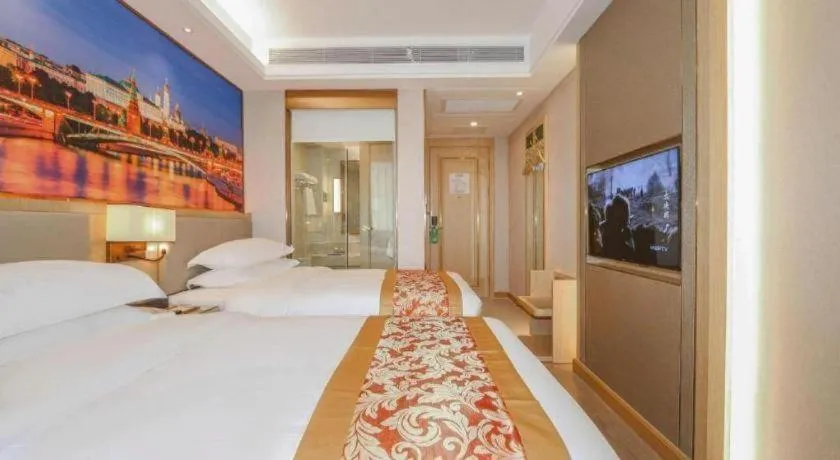 Bed in SHANGJINGHAO HOTEL （SAKATA SNOW ELEPHANT SUBWAY STATION SHOP）