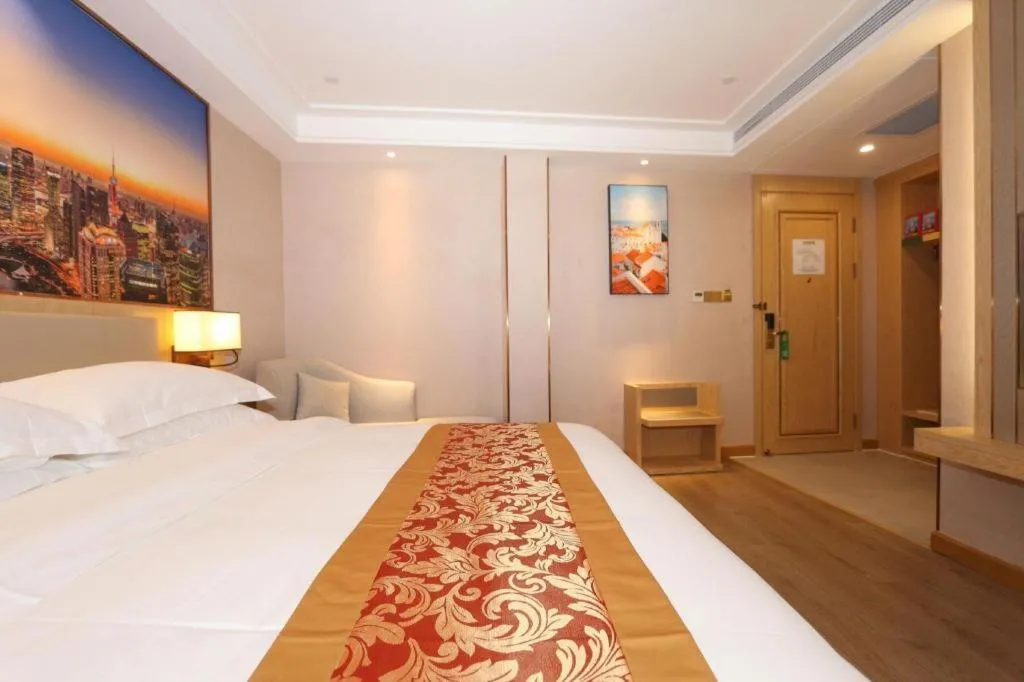 Bed in SHANGJINGHAO HOTEL （SAKATA SNOW ELEPHANT SUBWAY STATION SHOP）