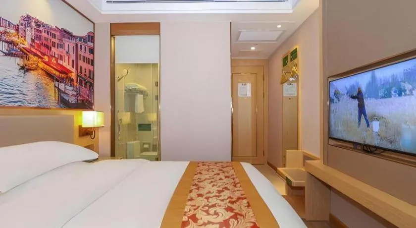 Bed in SHANGJINGHAO HOTEL （SAKATA SNOW ELEPHANT SUBWAY STATION SHOP）