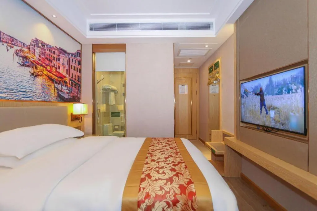 Bed in SHANGJINGHAO HOTEL （SAKATA SNOW ELEPHANT SUBWAY STATION SHOP）