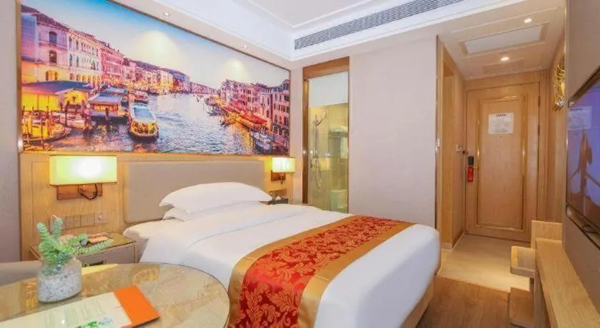 Bed in SHANGJINGHAO HOTEL （SAKATA SNOW ELEPHANT SUBWAY STATION SHOP）