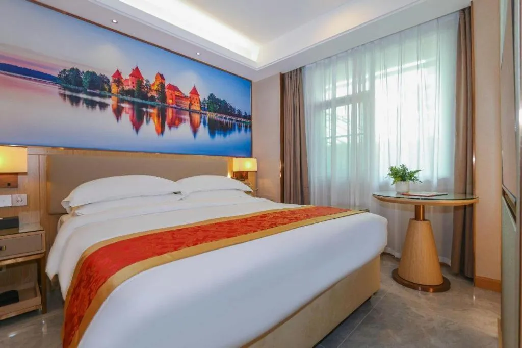 Bed in SHANGJINGHAO HOTEL （SAKATA SNOW ELEPHANT SUBWAY STATION SHOP）