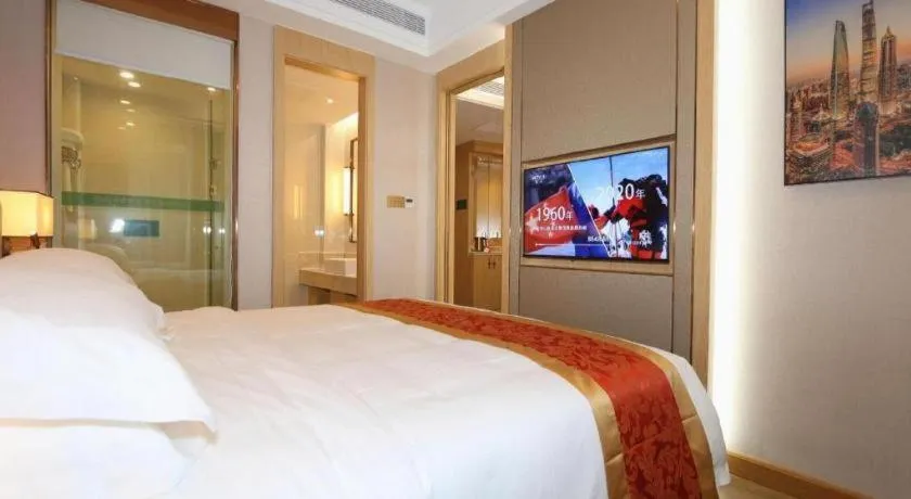 Bed in SHANGJINGHAO HOTEL （SAKATA SNOW ELEPHANT SUBWAY STATION SHOP）